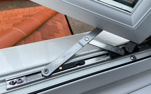 Window Fitters Ltd technician servicing friction stay hinges and double glazing hardware